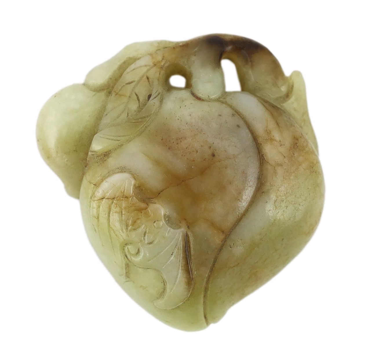 A Chinese pale celadon and russet jade carving of peaches and two bats, 17th century, the stone with pale russet and brown inclusions, 5.9cm. Condition - natural discolouration and flaws within the jade but otherwise goo